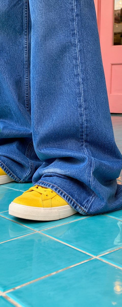 Before: long jeans bunching over yellow sneakers