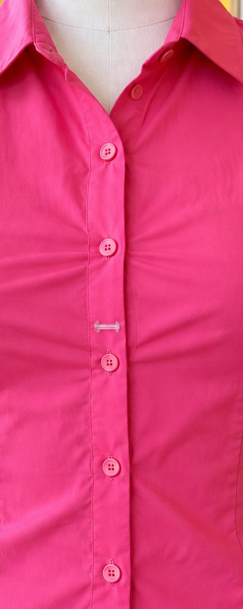 After: the blouse closed flat with one small clear fastener